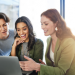 Advanced Legal Research on laptop device with tree women exploring data