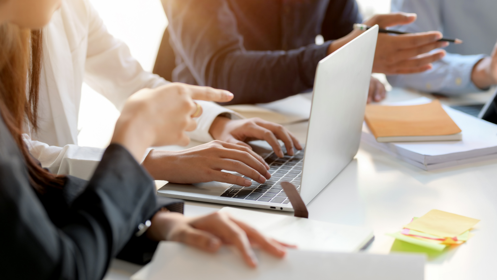 Data Privacy In House Team at desk and laptop