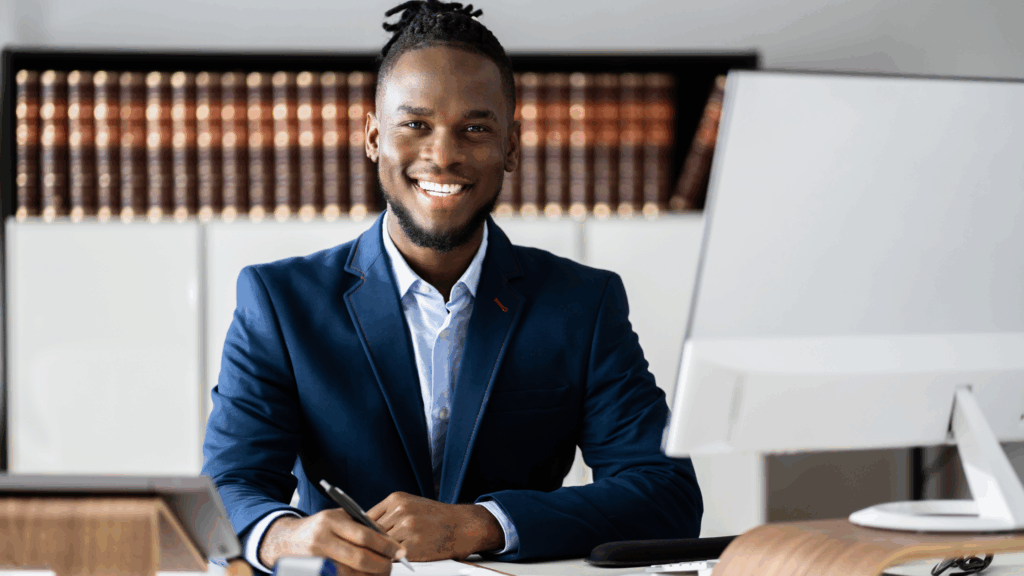 Socratic Method Blog image of male attorney at desk on desktop working in office
