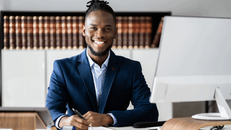 Socratic Method Blog image of male attorney at desk on desktop working in office